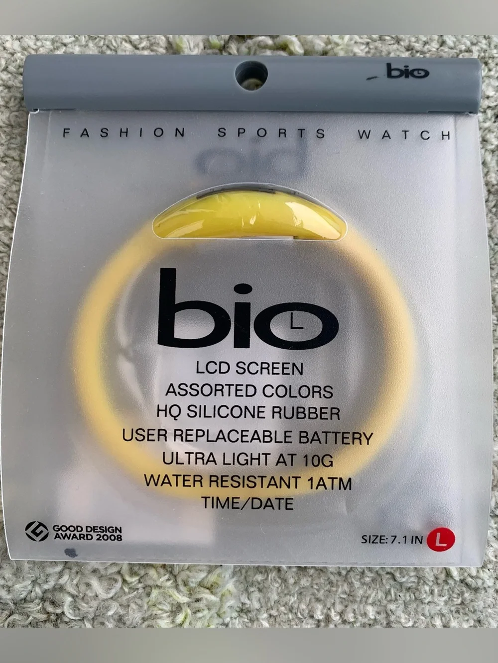 yellow Bio digital sports watch inside its translucent packaging